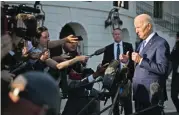  ?? ?? US President Joe Biden speaks with reporters before departing from the White House on Marine One on Friday in Washington, DC (AFP)