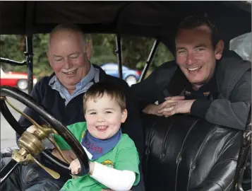  ??  ?? Mick Nolan, Dylan Mulligan and Keith Nolan in Mick’s 1914 Model T.