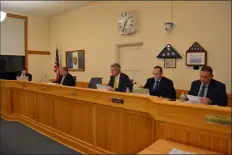  ?? PETER CURRIER — LOWELL SUN ?? From left, Town Manager John Curran, Select Board member Michael Rosa, Chair Andrew Deslaurier, and members Michael Riley and John Burrows during the March 6, 2023 Select Board meeting. Member Kim Conway participat­ed remotely.
