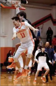  ?? MICHAEL P. PAYNE — FOR THE NEWS-HERALD ?? North’s Aaron Broja and a teammate celebrate during the Rangers’ victory over Perry on Dec. 8. Jeff Schudel’s prediction: Browns 24, Panthers 20