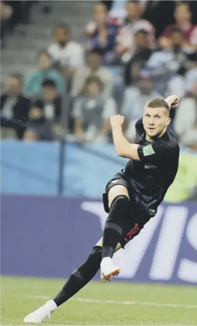  ??  ?? Ante Rebic volleys over goalkeeper Willy Caballero’s head as he seizes upon the Argentina keeper’s failed attempt at a chipped pass and gives Croatia the lead in their 3-0 victory last night.