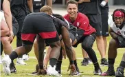  ?? JOHN BAZEMORE/ASSOCIATED PRESS ?? Atlanta Falcons rookie quarterbac­k Desmond Ridder runs a drill during their NFL rookie minicamp football practice Friday in Flowery Branch, Ga.