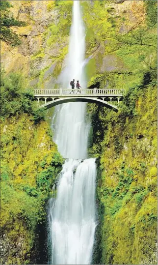  ?? Steve McAlister Getty Images ?? VISITORS f lock to Multnomah Falls, just outside of Portland, Ore., so get an early start.