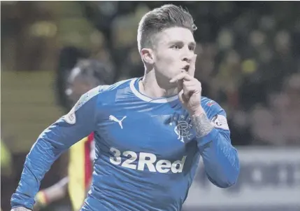  ??  ?? 0 Josh Windass shushes the travelling Rangers support at Firhill after scoring against Partick Thistle.