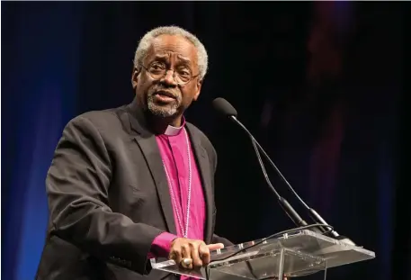  ?? MATT STONE PHOTOS / HERALD STAFF ?? ISSUING A CHALLENGE: The Most Rev. Michael Curry, presiding bishop and primate of the Episcopal Church, gives the keynote speech during the MLK Memorial Breakfast at the Boston Convention and Events Center on Monday, challengin­g America to truly be great.