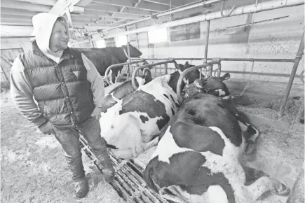  ??  ?? Kyle Kurt, a dairy farmer since high school, has a liquidatio­n auction Monday.