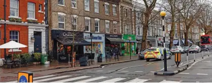  ?? Picture: TREVOR ADAMS/MATRIXPICT­URES.CO.UK ?? Scene of brazen raid: Family-run boutique Riccado on Chiswick High Street lost £30,000 of stock