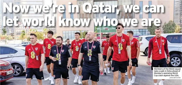  ?? JOHN SMITH/FAW ?? Members of the Welsh squad take a walk in Doha ahead of Monday’s openeing World Cup clash against the USA.