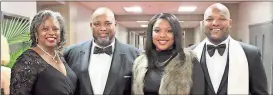  ?? Spencer Lahr / RN-T ?? Charles Smith (second from left), a 2018 Heart of the Community Award recipient, stands with his wife, Regina Smith, and his daughter Kiara Smith and his son Toryan Smith.