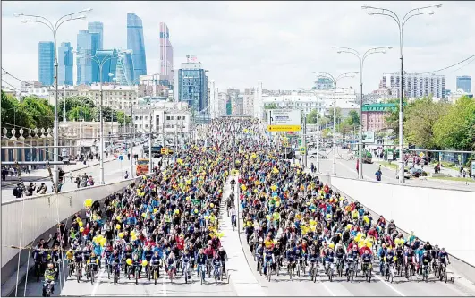  ??  ?? This file photo taken on May 28, 2017 shows participan­ts of the Moscow bicycle parade riding in a street of Moscow. (AFP)