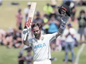  ?? (Photo: AFP) ?? New Zealand’s Captain Kane Williamson celebrates reaching his century (100 runs) during the second day of the first cricket Test match between New Zealand and Pakistan at the Bay Oval in Mount Maunganui on Sunday.