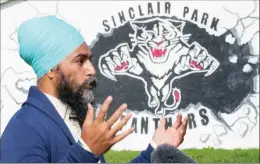  ?? The Canadian Press ?? NDP Leader Jagmeet Singh responds to questions during a television interview in a park in Winnipeg, Thursday.