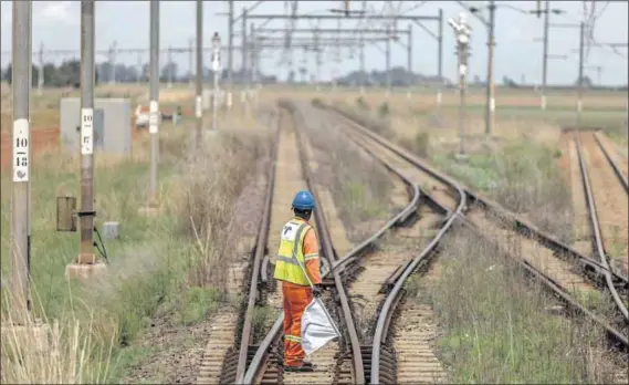  ?? Photo: Guillem Sartorio/getty Images ?? New track: Recent law reforms could transform the way state-owned enterprise­s, such as Transnet, operate.