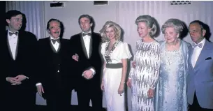  ?? Picture: WIREIMAGE ?? BLOND AMBITION: Robert Trump, Fred Trump, Donald Trump, Ivana Trump, Elizabeth Trump, Mary Anne Trump and Roy Cohn at a function in the Waldorf Hotel in New York in 1985