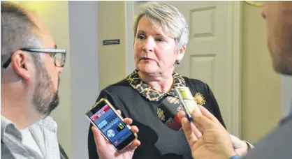  ?? STU NEATBY/THE GUARDIAN ?? Finance Minister Darlene Compton speaks about the capital budget during a media briefing on Friday. The PC government released its $156-million capital budget Friday morning.