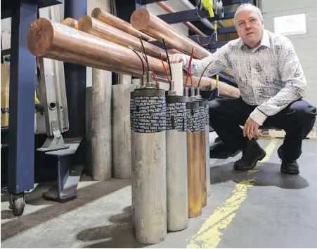  ?? DARREN STONE, TIMES COLONIST ?? EMCS Industries chief executive Trevor Tasker with some of the copper anodes used in the company’s anti-fouling and anti-corrosion products deployed on cruise ships and ferries. A deal with Canada Metal provides instant global expansion, he says.