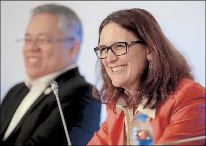  ?? AFP ?? Cecilia Malmstrom, European Union commission­er for trade, joins Trade Secretary Ramon Lopez at a press conference during the 23rd Associatio­n of Southeast Asian Economic Ministers’ Retreat and Related Meetings in Manila last March 10.