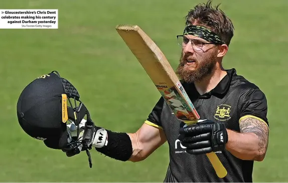  ?? Stu Forster/Getty Images ?? > Gloucester­shire’s Chris Dent celebrates making his century against Durham yesterday