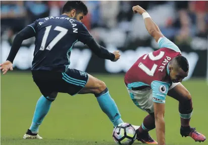  ??  ?? West Ham’s Payet trying to get past Middlesbro­ugh’s Antonio Barragan