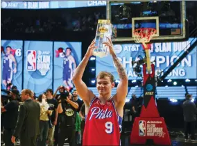  ?? AP PHOTO/RICK BOWMER ?? Mac McClung of the Philadelph­ia 76ers reacts after winning the slam dunk competitio­n of the NBA basketball All-Star weekend Saturday, Feb. 18, 2023, in Salt Lake City.