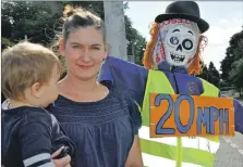  ??  ?? School mum and road safety campaigner Beth Hadden in 2018 with Nell the scarecrow, reminding drivers to slow down.