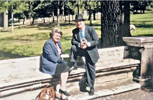  ?? ?? Abe Zapruder, above, with his wife Lillian, holds his 8mm camera just after he’d bought it