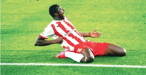  ??  ?? Super Eagles invitee, Sadiq Umar celebrates after scoring for UD Alimera in the Spanish Segunda Division