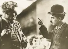  ?? Bancroft Library, UC Berkeley 1918 ?? Redmond with his friend Charlie Chaplin, who hired him as an actor and also supported Redmond’s work as a painter.