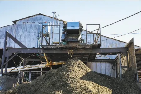  ?? Photos by Gabrielle Lurie / The Chronicle ?? Manure is separated at Point Reyes Farmstead Cheese Co. Waste from cattle gives off methane, a potent greenhouse gas.