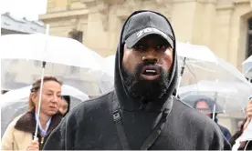  ?? Photograph: Stéphane Cardinale/Corbis/Getty Images ?? Kanye West at Paris fashion week at the weekend.