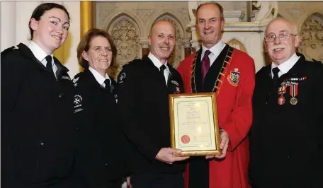  ??  ?? Mayor Pio Smith Presenting Members of St Johns Ambulance with a Mayoral Award for their work in the Community Left Emmajane UiEligh, Angela Haggins, Colin Maher and Martin O Connor at the Mayoral Awards at the Highlanes Gallery