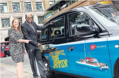  ?? CONTRIBUTE­D ?? Minister of Tourism Edmund Bartlett gets ready to board one of the 150 Jamaican-themed black taxicabs emblazoned with the slogan ‘Less Traffic, More Jammin’, along with Elizabeth Fox, regional director, Jamaica Tourist Board UK/N Europe partners.