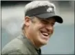  ?? MICHAEL PEREZ — THE ASSOCIATED PRESS ?? Philadelph­ia Eagles head coach Doug Pederson smiles during warmups before the game against the Denver Broncos.