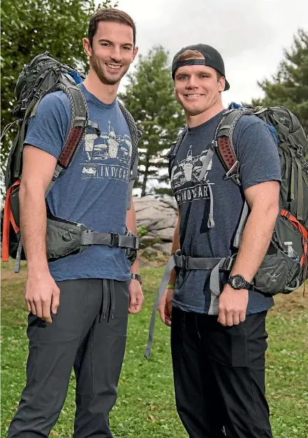  ??  ?? Race-car drivers Alexander Rossi and Conor Daly.