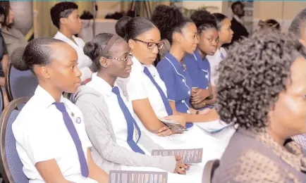  ??  ?? Members of the Immaculate Conception High School Productivi­ty Club pay keen attention during the productivi­ty forum at the Jamaica Productivi­ty Centre.