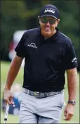  ?? JOE MAHONEY — THE ASSOCIATED PRESS ?? Winner Phil Mickelson walks to the 18th green during final-round play in the Dominion Energy Charity Classic.