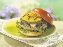  ?? DOLE ?? This recipe for Grilled Pineapple & Pesto Turkey Burgers uses perfect pineapple rings to give a sweet kick to grilled burgers.