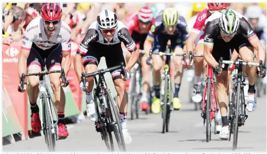  ??  ?? Australia’s Michael Matthews, center left, crosses sprints to win the 16th stage of the Tour de France cycling race Tuesday. Norway’s Edvald Boasson Hagen, right, finished second and Germany’s John Degenkolb third. (AP)