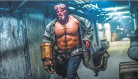  ?? MARK ROGERS Lionsgate ?? A SCENE from “Hellboy,” the Lionsgate reboot that bombed at the box office.