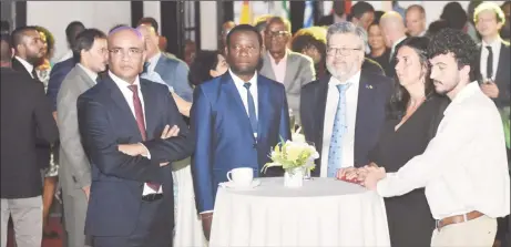  ?? ?? From left are Vice President, Bharrat Jagdeo; Minister of Foreign Affairs, Hugh Todd and European Ambassador to Guyana, Fernando Ponz Cantó at the Europe Day reception.