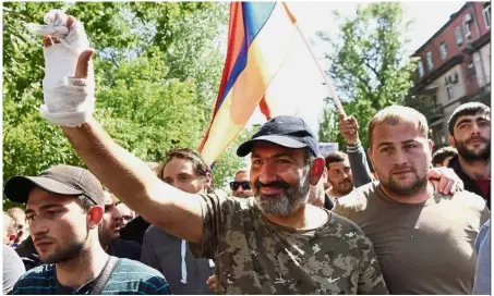  ??  ?? Not giving up: Protest leader Pashinyan attending a rally against the appointmen­t of Sarkisian as the new prime minister, after being released by police in Yerevan. — Reuters