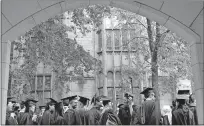  ??  ?? In this May 24, 2010, photo, future graduates wait for the procession to begin for commenceme­nt at Yale University in New Haven, Conn. The Biden Justice Department says it is dismissing its discrimina­tion lawsuit against Yale University. The Trump administra­tion alleged last year that the university was illegally discrimina­ting against Asian American and white applicants. [JESSICA HILL/ASSOCIATED PRESS FILE PHOTO]