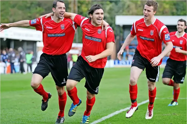  ?? ?? Fom left, Jim Rollo, Andy Gallinagh, Marley Watkins and Adam Connolly celebratin­g Gallinagh’s first goal for the Romans in an FA Cup clash at Dover in 2011