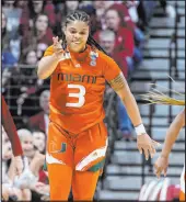  ?? Darron Cummings The Associated Press ?? Miami’s Destiny Harden (3) celebrates after her game-winner sent Indiana out of the tournament.