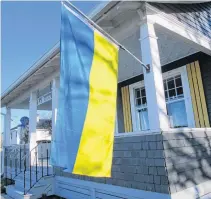  ?? PETER SIMPSON ?? Some Nova Scotia residences and businesses are flying Ukraine’s flag. The colour blue represents the blue skies above Ukraine and the yellow represents the country’s wheat fields. Ironically, blue symbolizes calm, while yellow symbolizes joy.