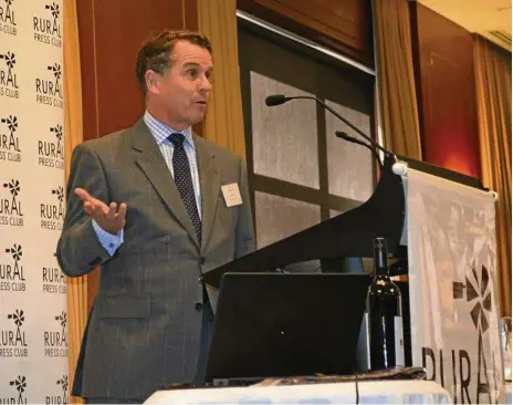  ?? PHOTO: ANDREA DAVY ?? TOUGH TOPIC: Willis Towers Watson managing director for agribusine­ss and weather, Julian Roberts, addressing the Rural Press Club event in Brisbane.