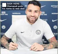  ??  ?? SIGN HERE: Otamendi puts his name to new deal