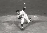  ?? Harry Matosian / Associated Press 1965 ?? Dodgers Hall of Famer Sandy Koufax throws against the Chicago Cubs en route to a perfect game in Los Angeles on Sept. 9, 1965. The Dodgers won 10.