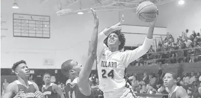  ?? MICHAEL LAUGHLIN/SOUTH FLORIDA SUN SENTINEL ?? Dillard’s Jalen Haynes tries to score on Stranahan’s Inady Legiste during their Big 8 semifinal game on Feb. 7 at Fort Lauderdale High School. Haynes was a Florida Associatio­n of Basketball Coaches first-team All-State selection.