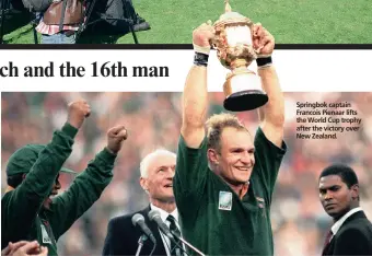  ??  ?? Springbok captain Francois Pienaar lifts the World Cup trophy after the victory over New Zealand.